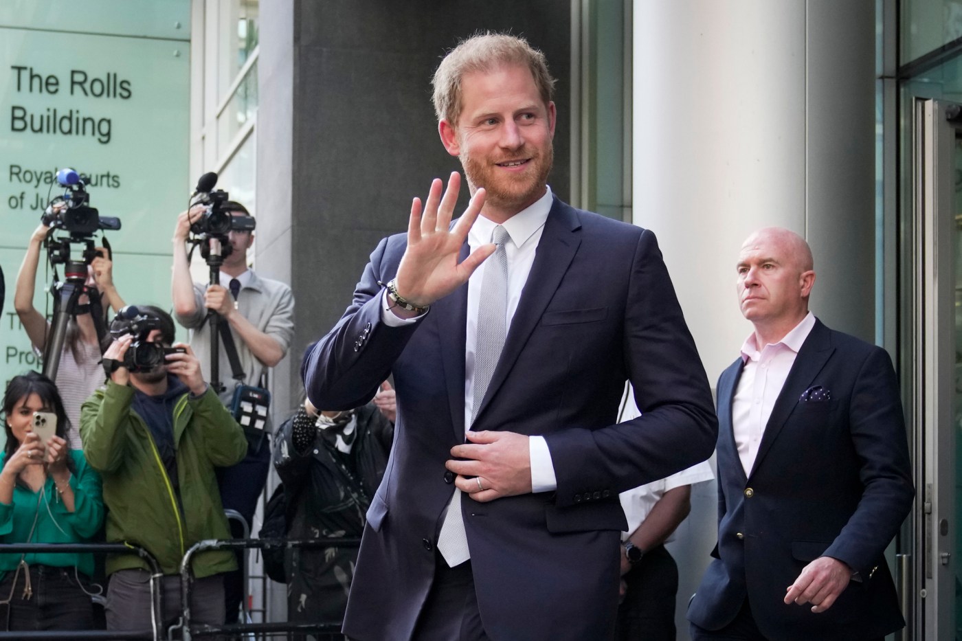 Prince Harry poses with Salinas firefighters amid news of $12 million court victory