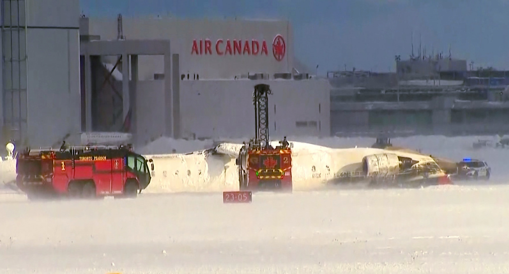 8 injured as Delta flight overturns on landing in Toronto