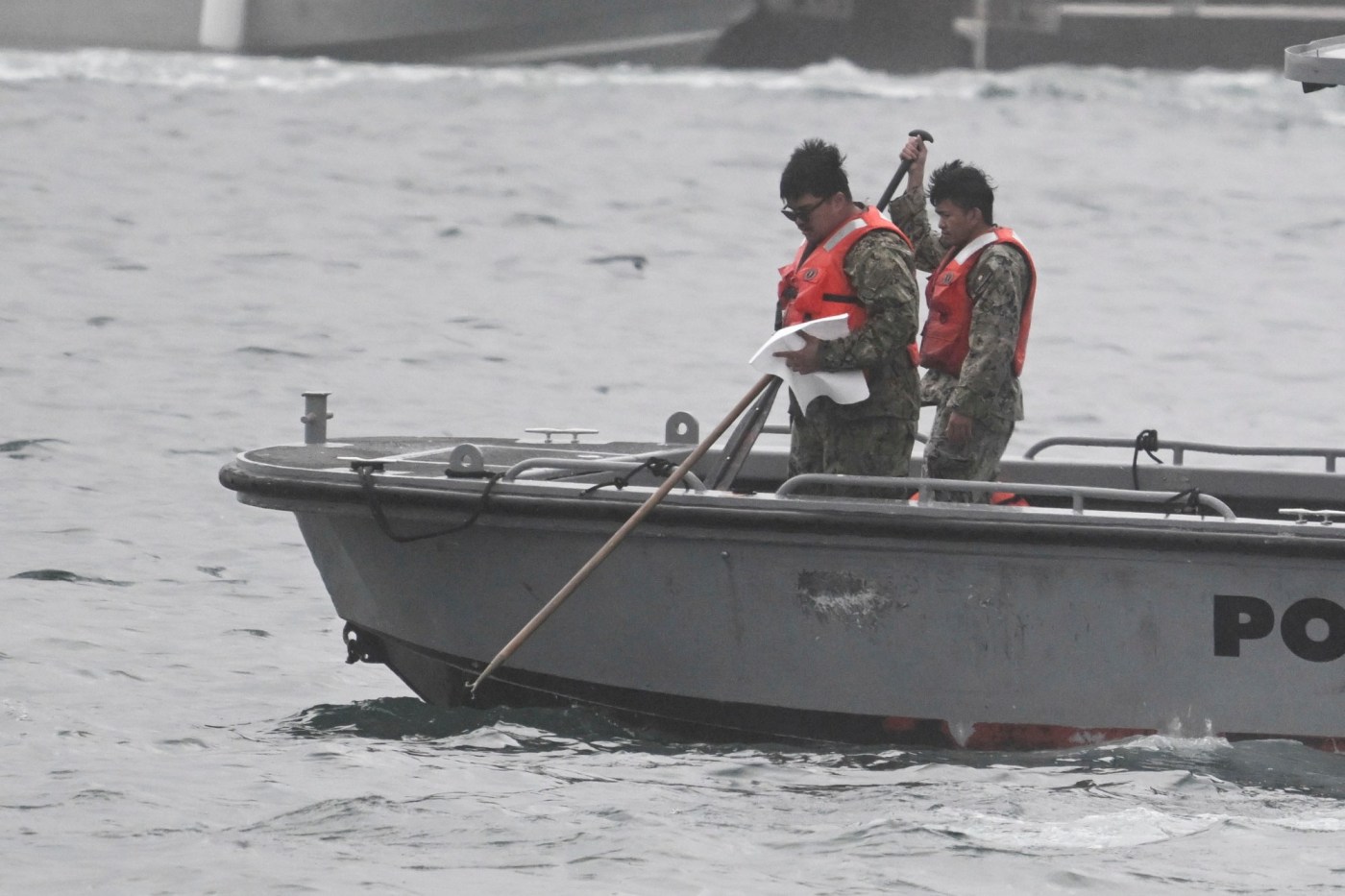 Winter storm hampers recovery of Navy jet in Southern California