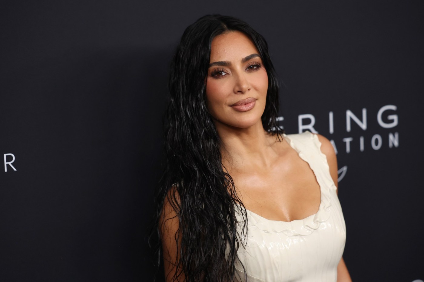 Kim Kardashian limits comments after posing with Musk Cybertruck