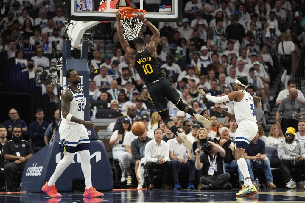 Jimmy Butler-led Warriors steal Game 1 from Wolves after Curry leaves with injury