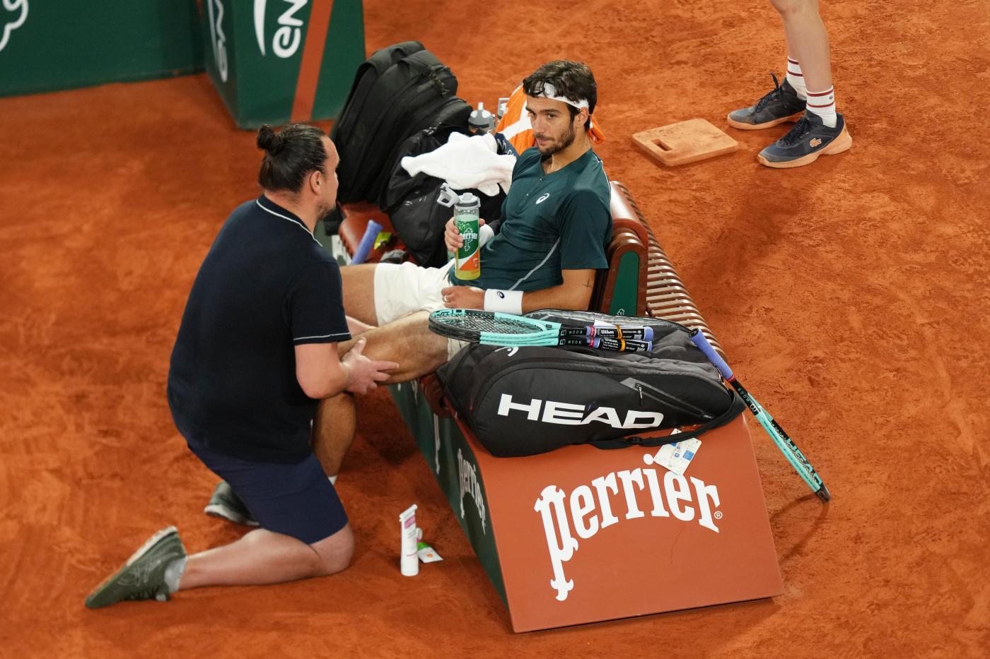 French Open: Carlos Alcaraz reaches final after Lorenzo Musetti retires with injury in fourth set