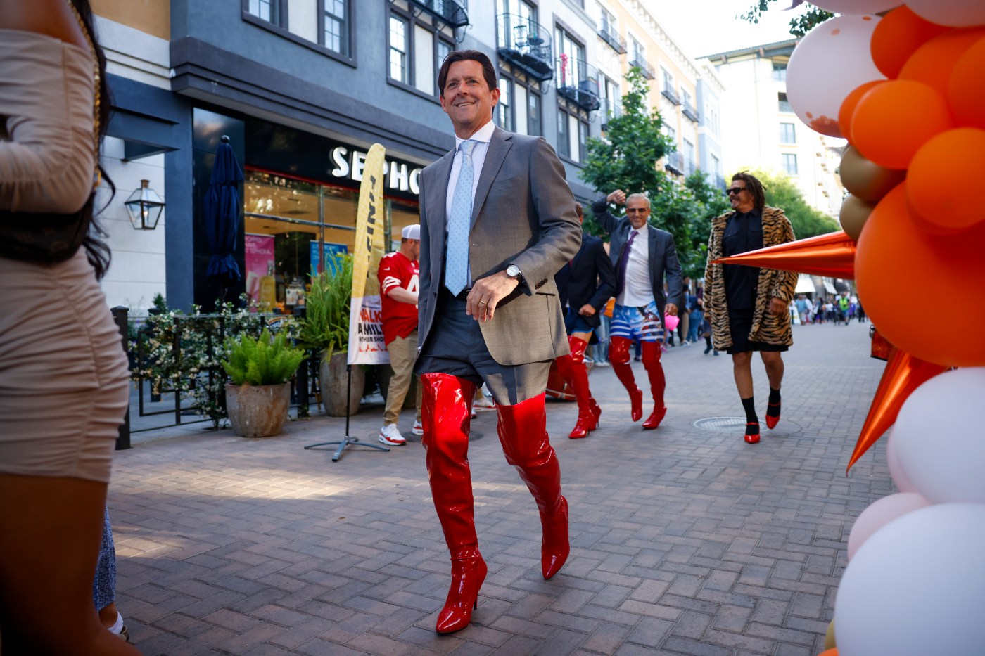 Guys stroll Santana Row in heels for YWCA’s Walk a Mile in Their Shoes
