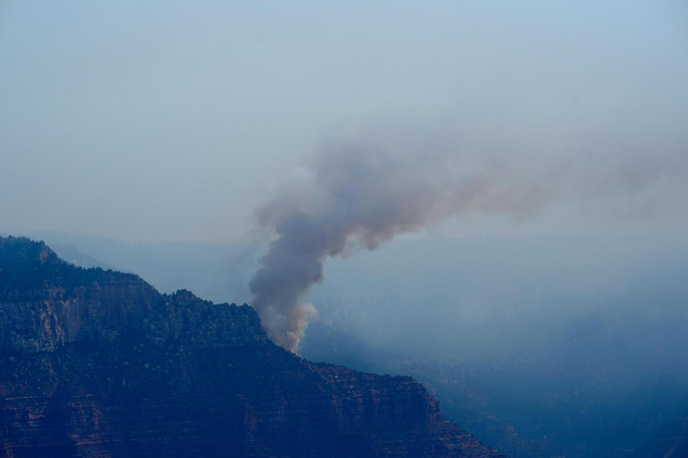 Fire crews along Grand Canyon are trying to save cabins after loss of historic lodge