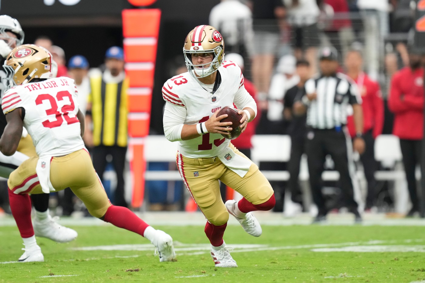 49ers lose starting guard Puni, two running backs to injury against Raiders