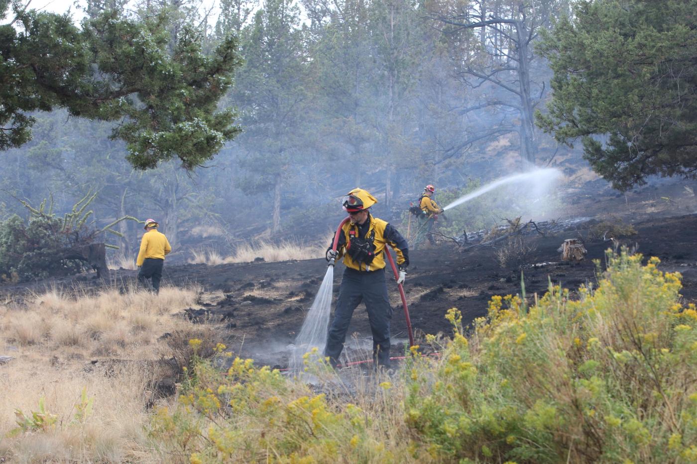 Garnet Fire: Firefighters try to corral forest blaze as lightning strikes bring risk of new ignitions