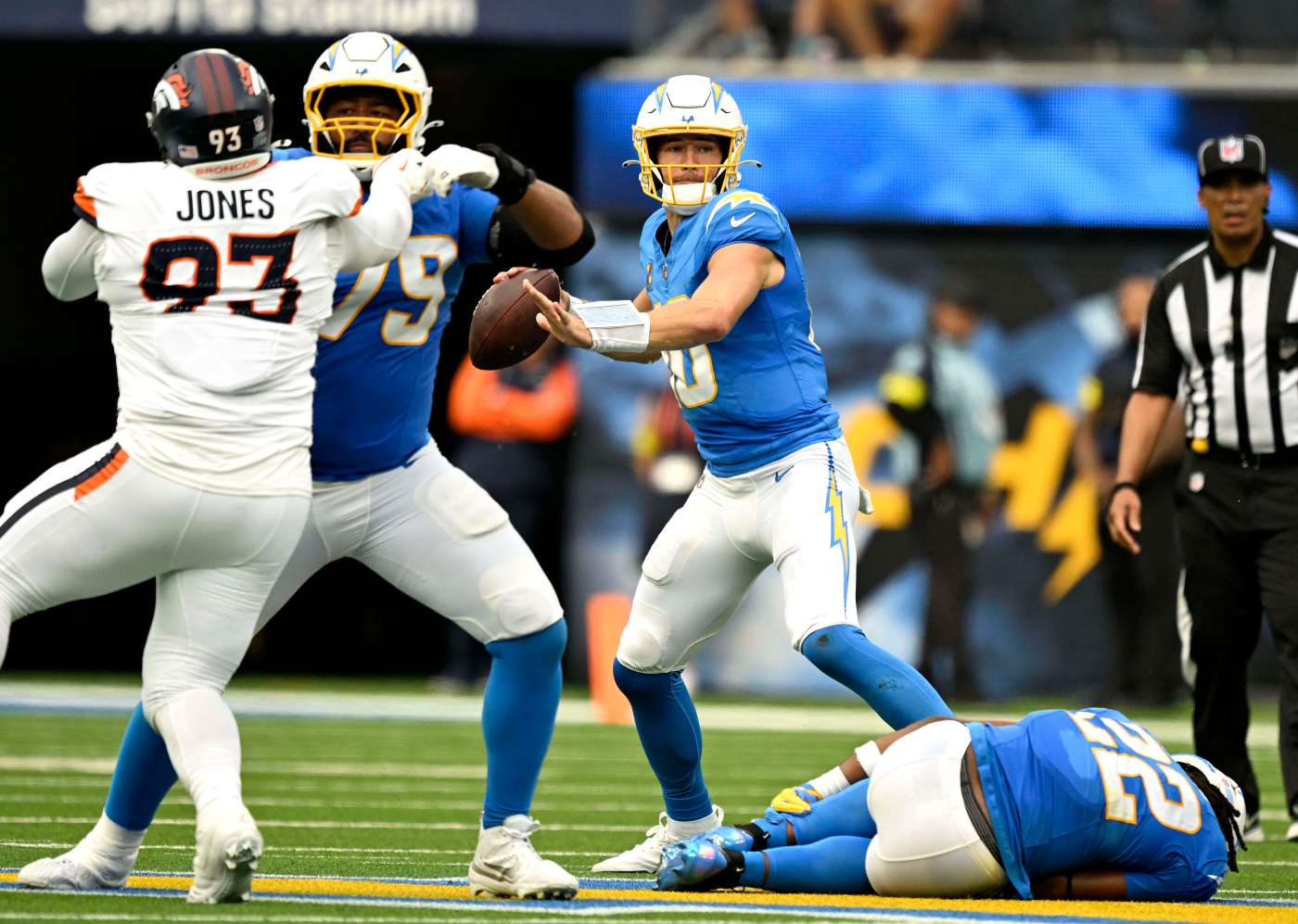 Chargers’ Najee Harris helped off field after injuring ankle against Broncos