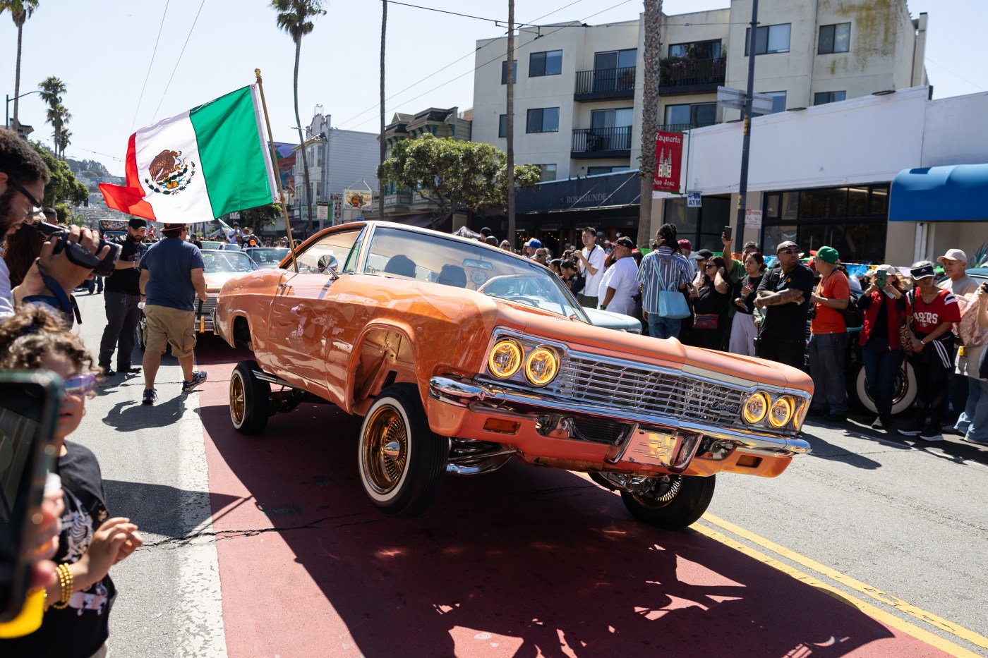 Photos: Lowrider parade cruises down Mission Street in San Francisco