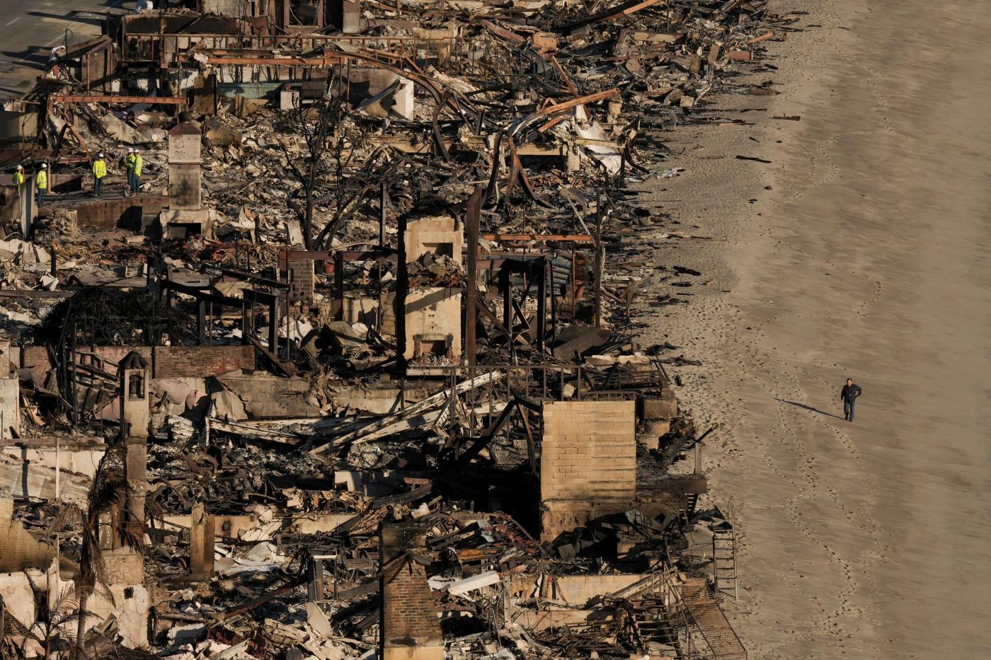 As wildfires scorch California, should insurers divest from fossil fuels?