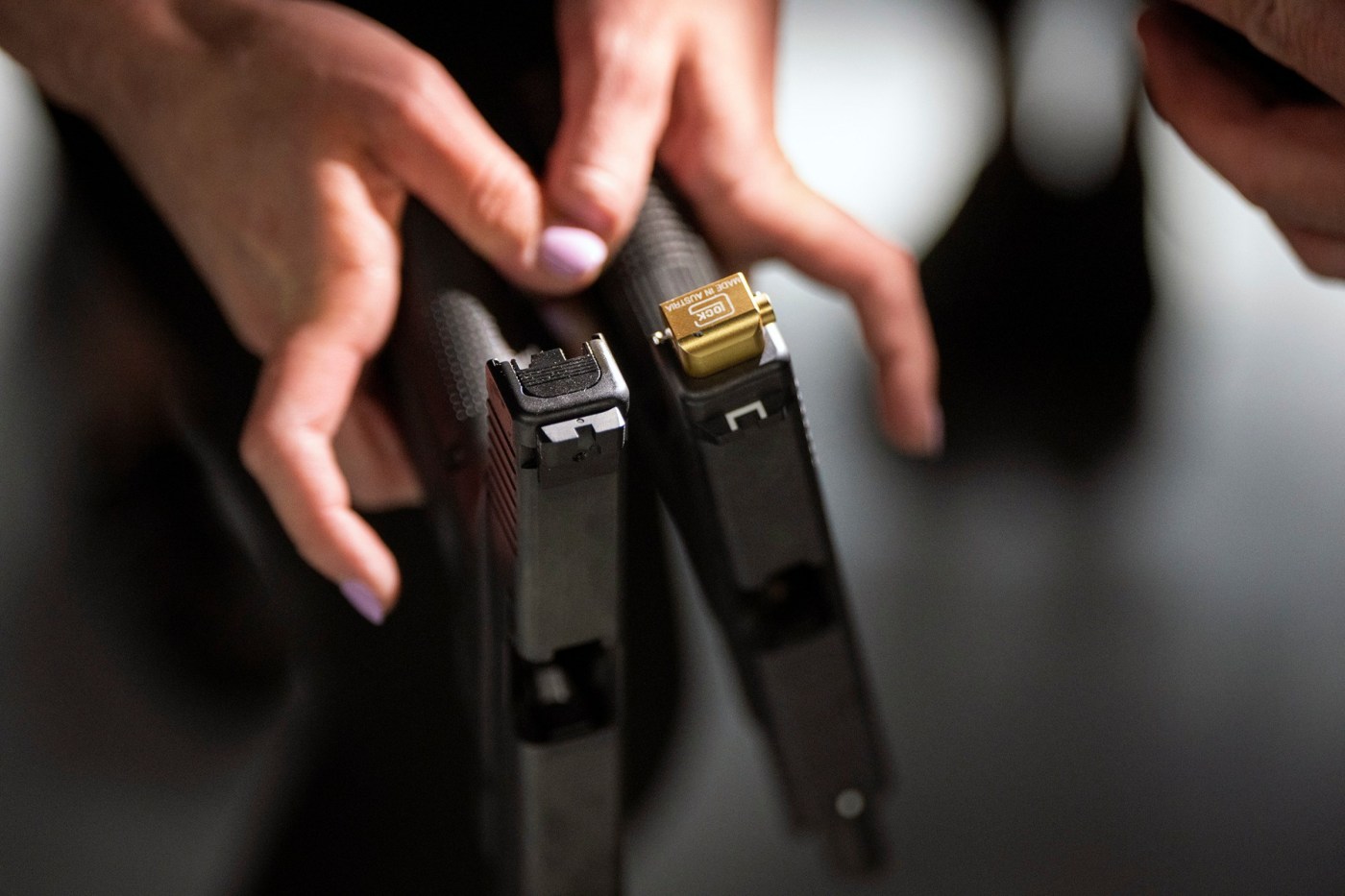 Gun groups sue after Gov. Newsom signs law to ban handguns that can convert to machine guns