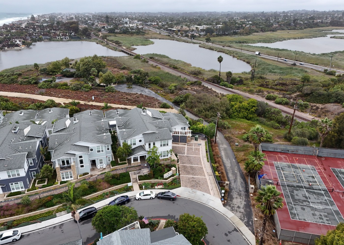 Homeowner fined $1.4 million by Coastal Commission opens gate to California beach and lagoon